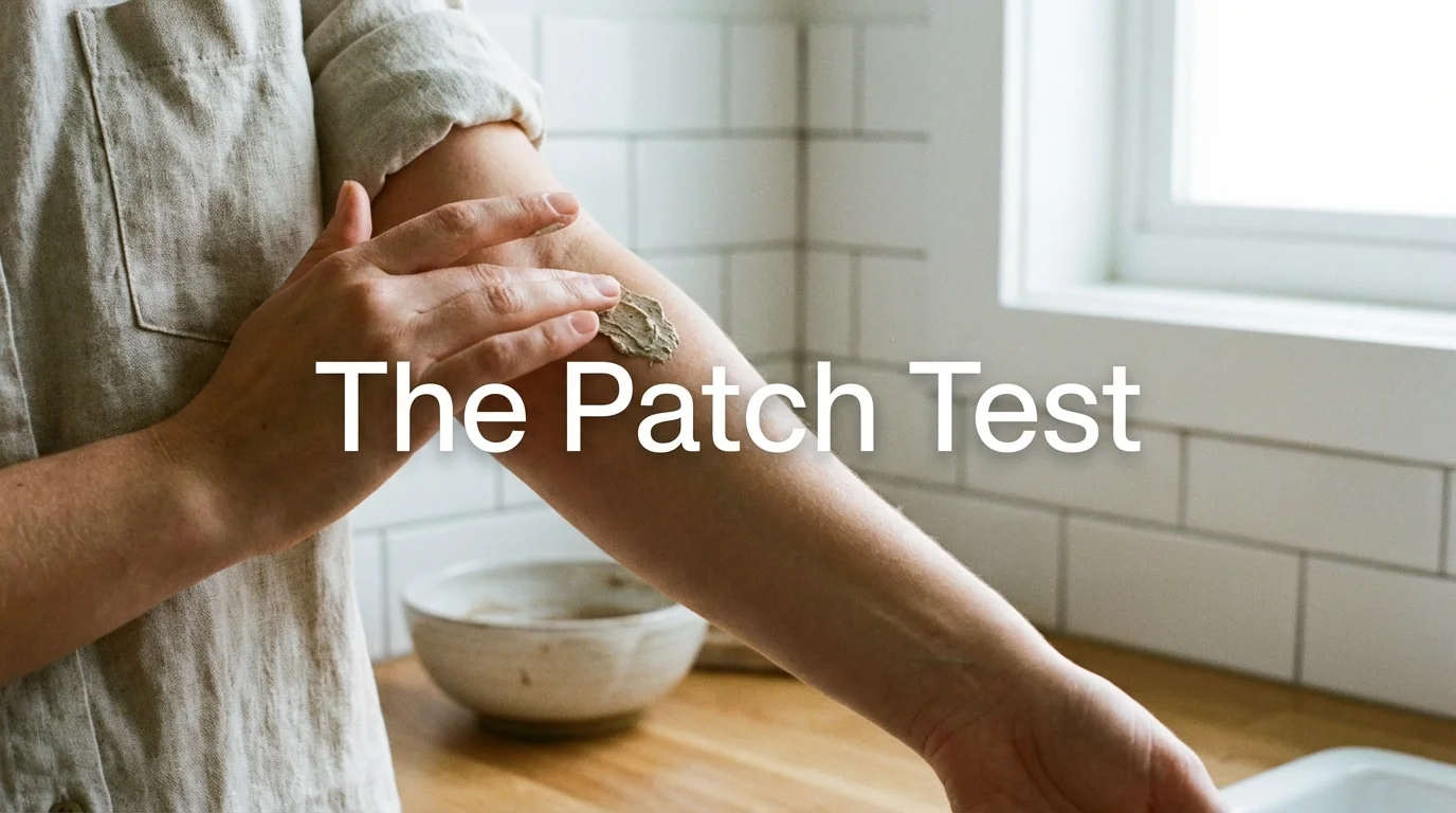 A person performing a skin patch test on their inner arm.