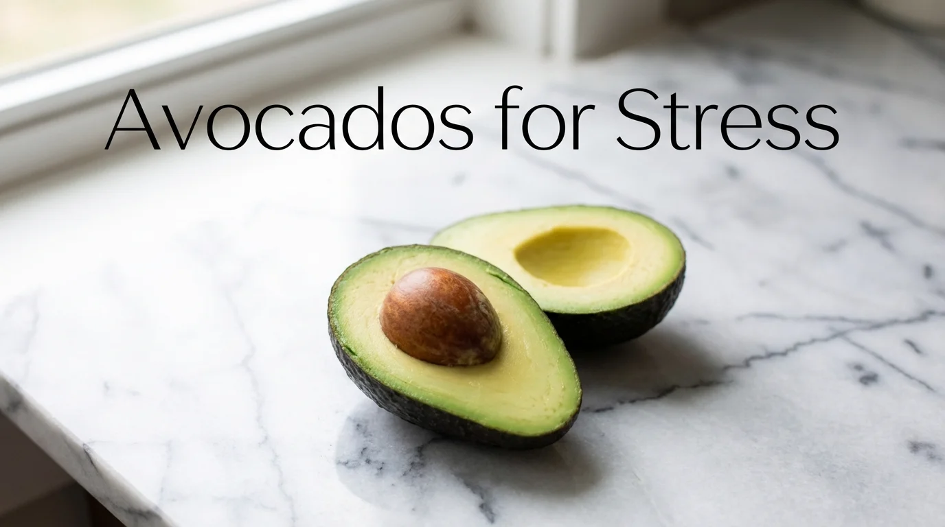 Sliced ripe avocado on a marble surface.